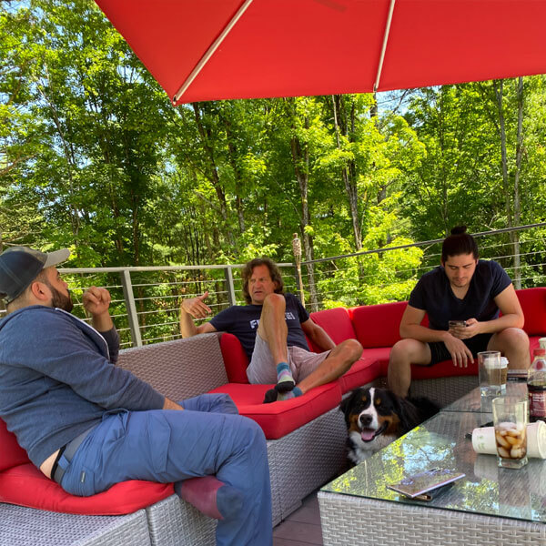 Hanging out on the deck with friends and a dog