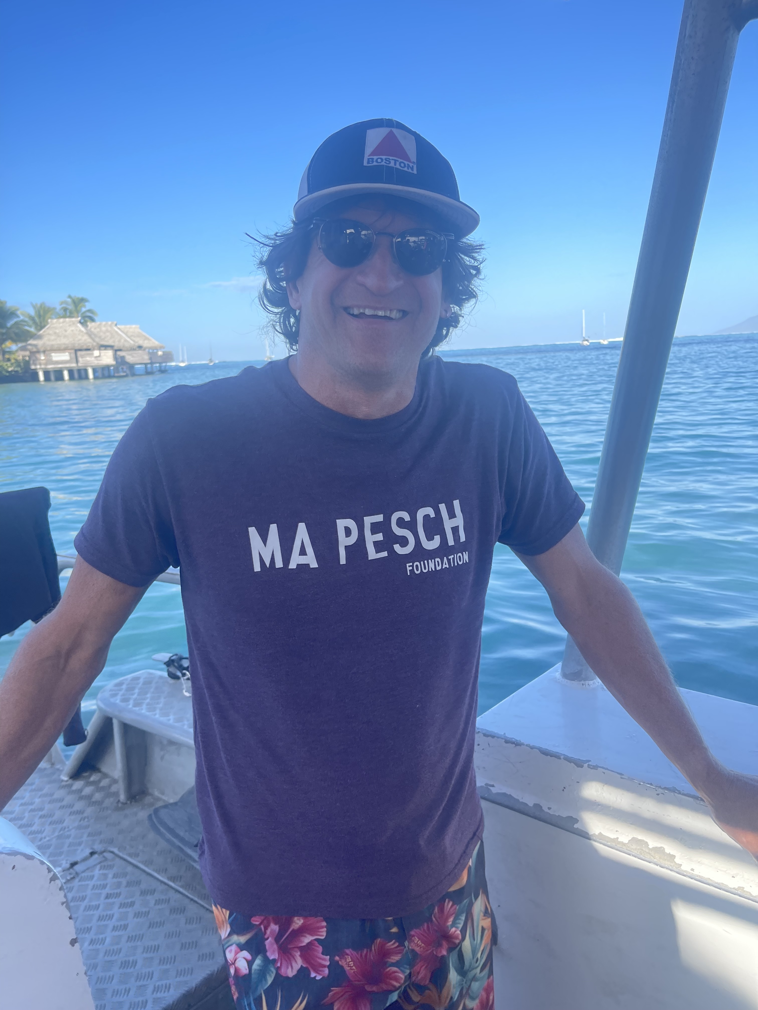 Wearing a Ma Pesch Foundation t-shirt