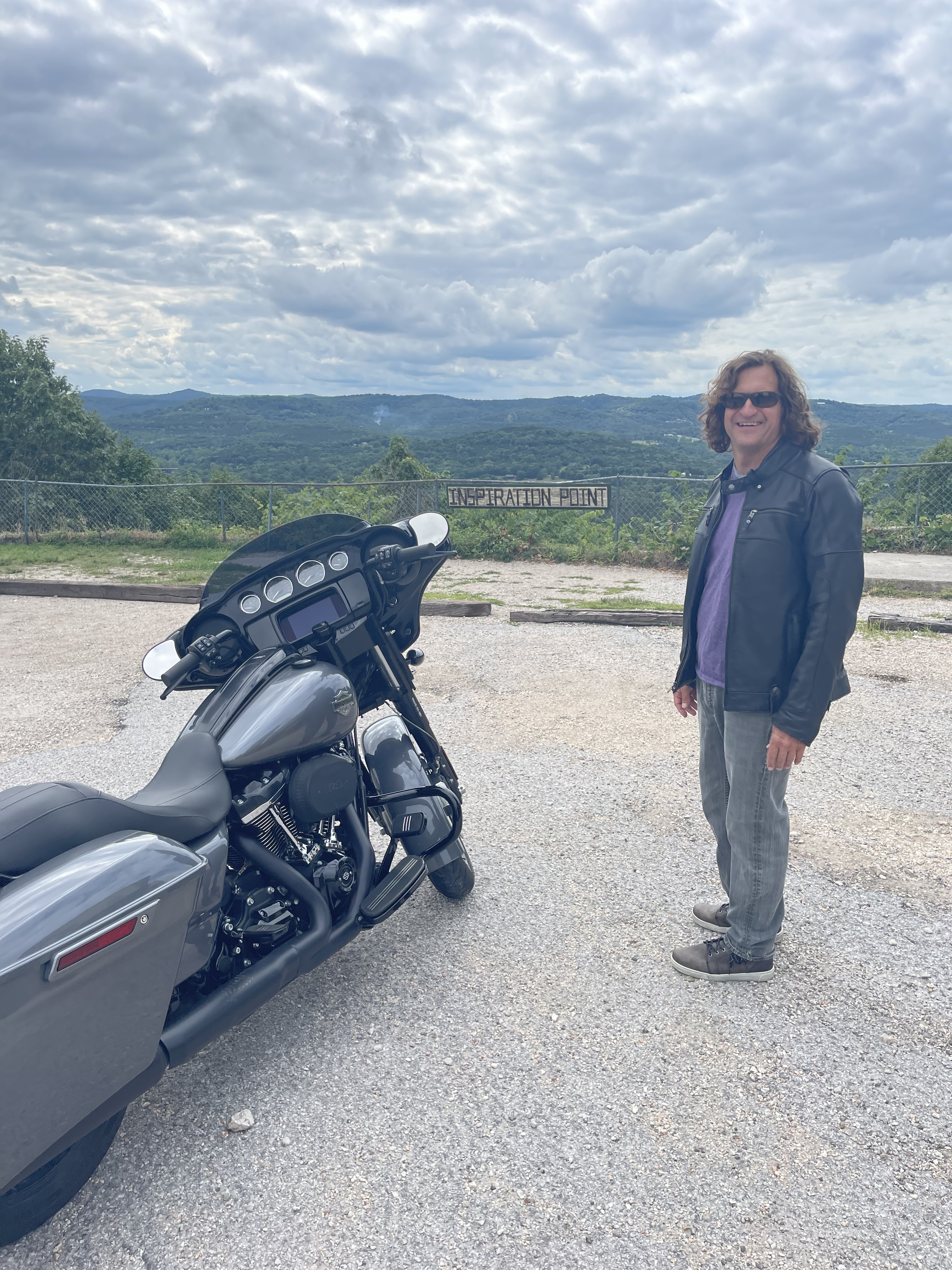 Standing next to a motorcycle at Inspiration Point