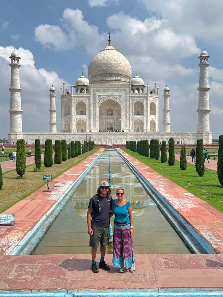 Standing in front of the Taj Mahal